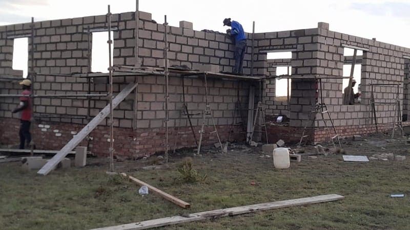 New Hope construction site with brick walls