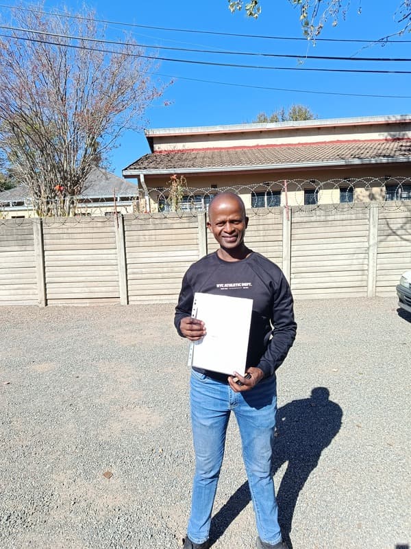 Johannes Twala standing outdoors